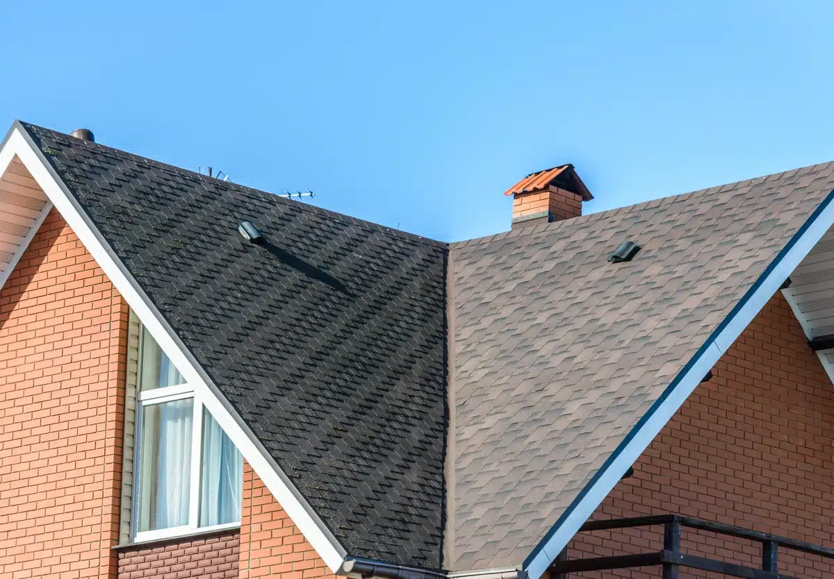 house with asphalt shingle roof and vents on
