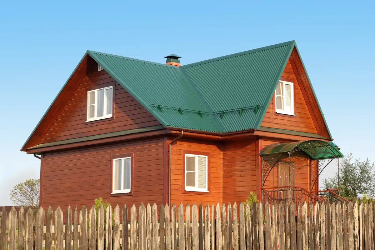house with green metal roof